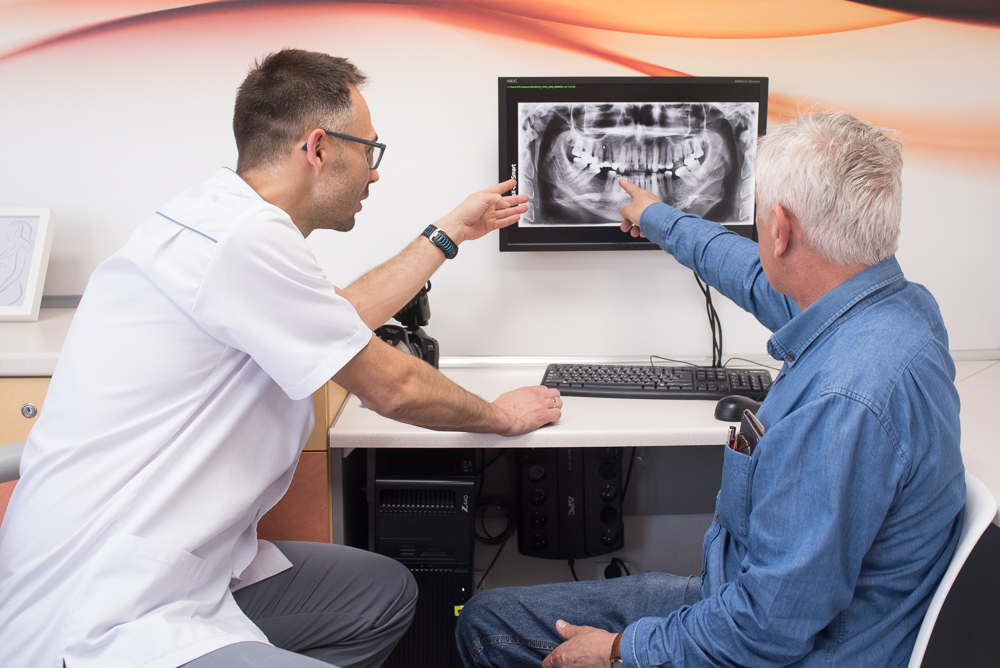 Denti - chce dowiedzieć się więcej o implantach